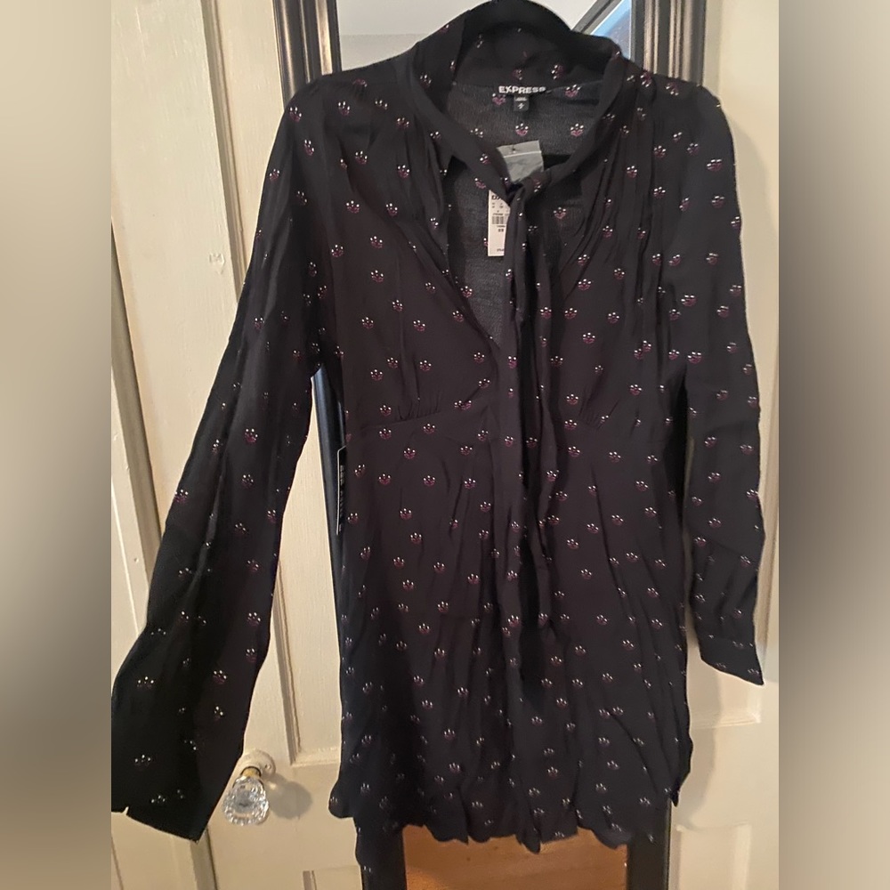 Express skater dress with tie neck/peephole detail